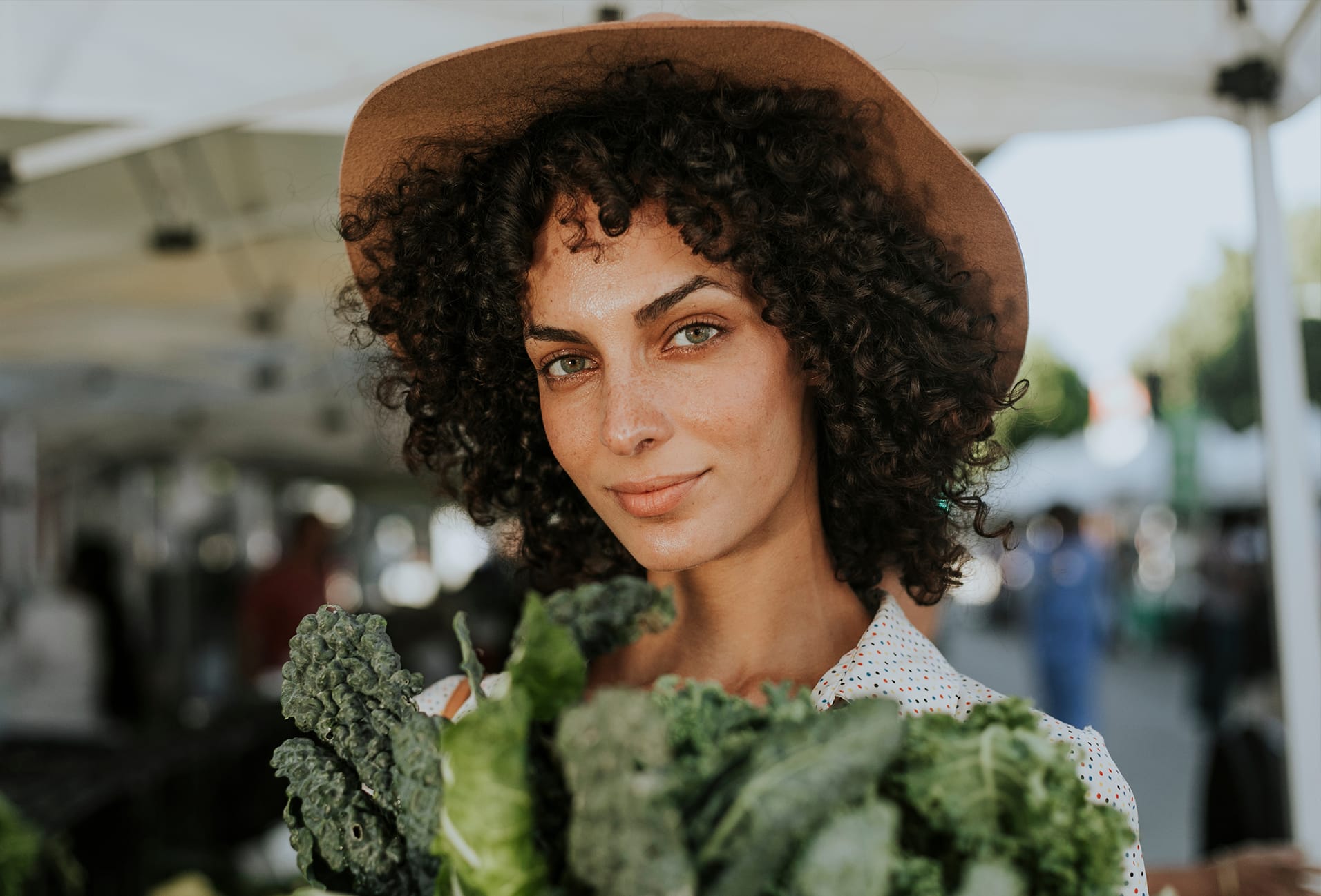 woman holding kale