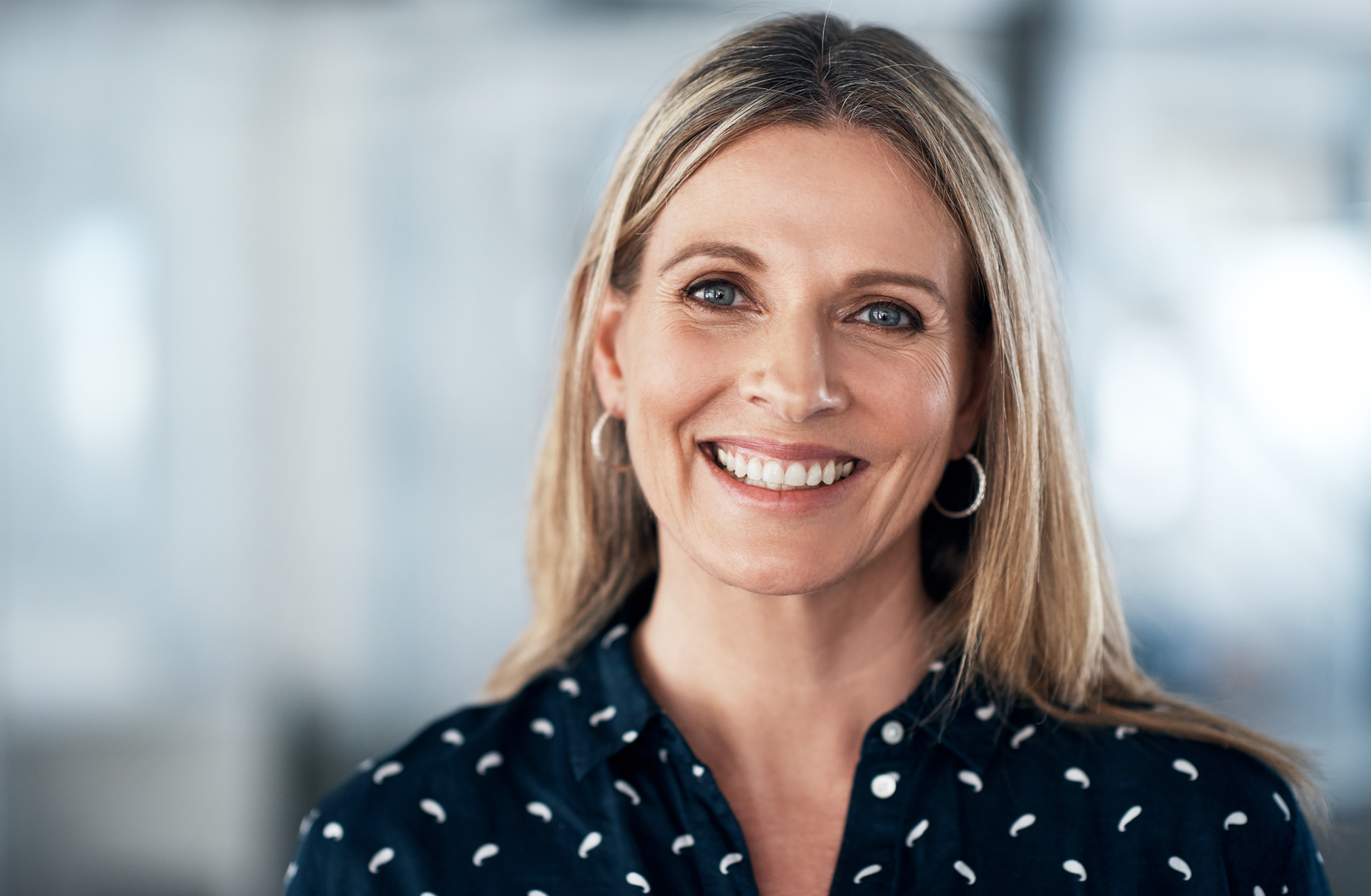 woman with blonde hair smiling